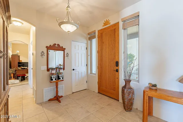 a dining room with a sink a counter top space and appliances