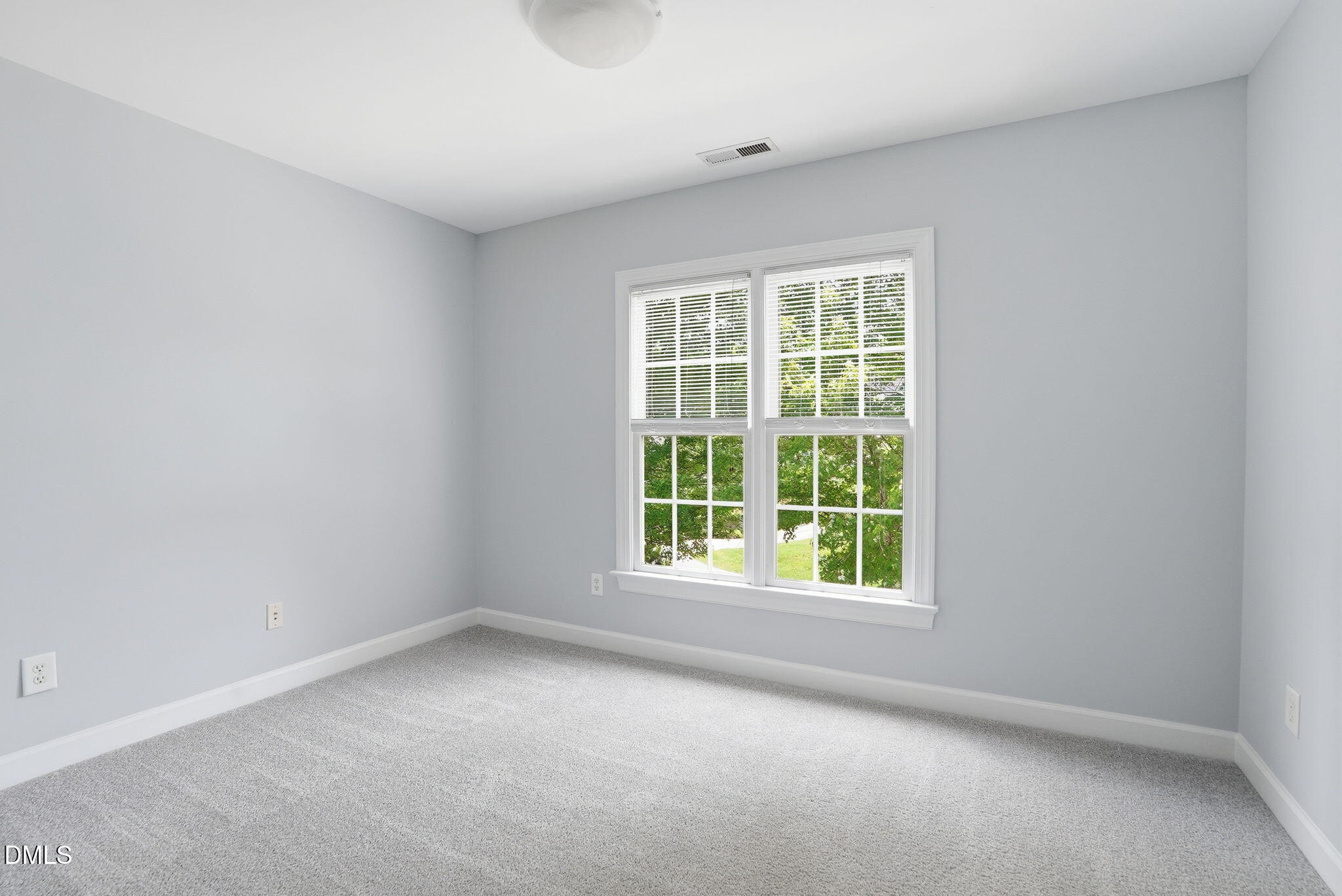 7 Morgans Ridge Lane Durham, NC 27707 - Photo 42 of 75 an empty room with a window