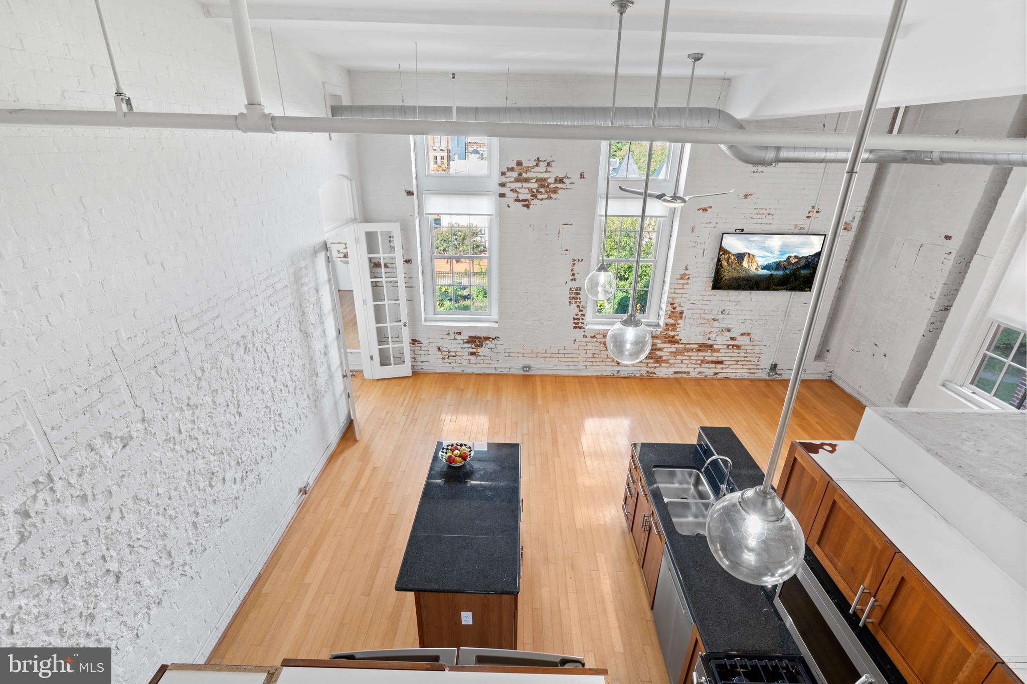 440 12th Street Northeast, Unit 210 Washington, DC 20002 - Photo 17 of 26 Loft overlooking the kitchen