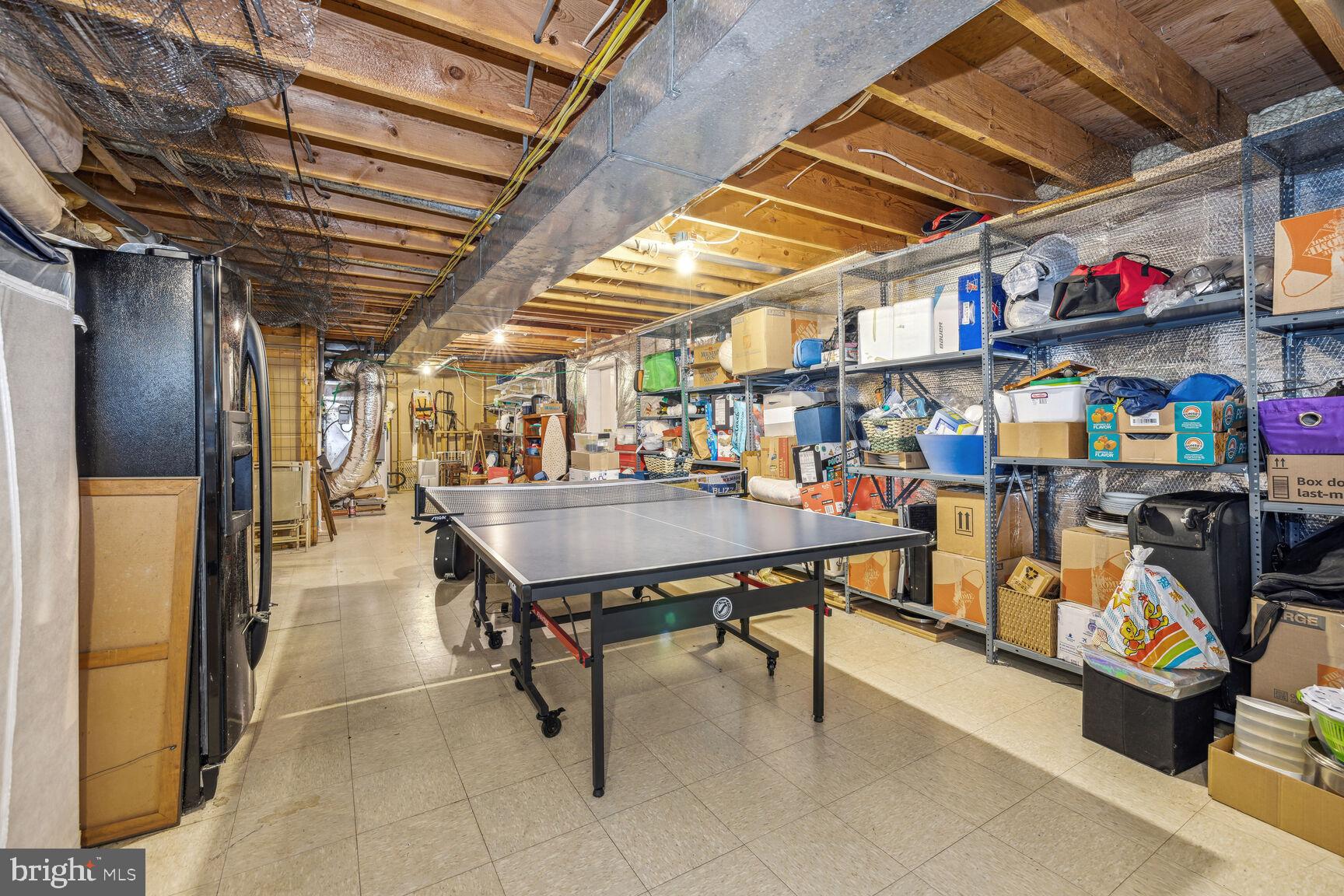 13303 Query Mill Road North Potomac, MD 20878 - Photo 31 of 42 Large storage room, door to yard