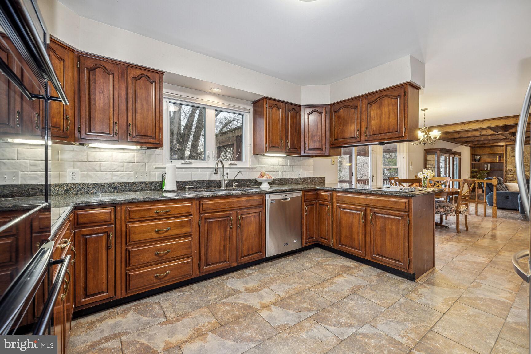 13303 Query Mill Road North Potomac, MD 20878 - Photo 10 of 42 Large open kitchen