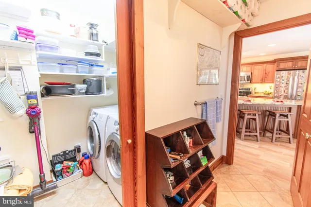 a view of living room with furniture and a flat screen tv