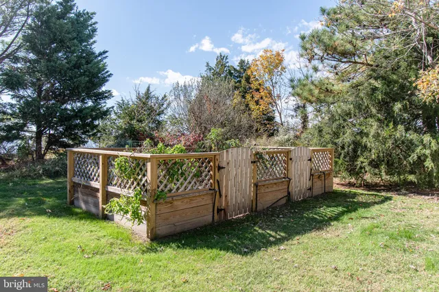 a view of a wooden fence