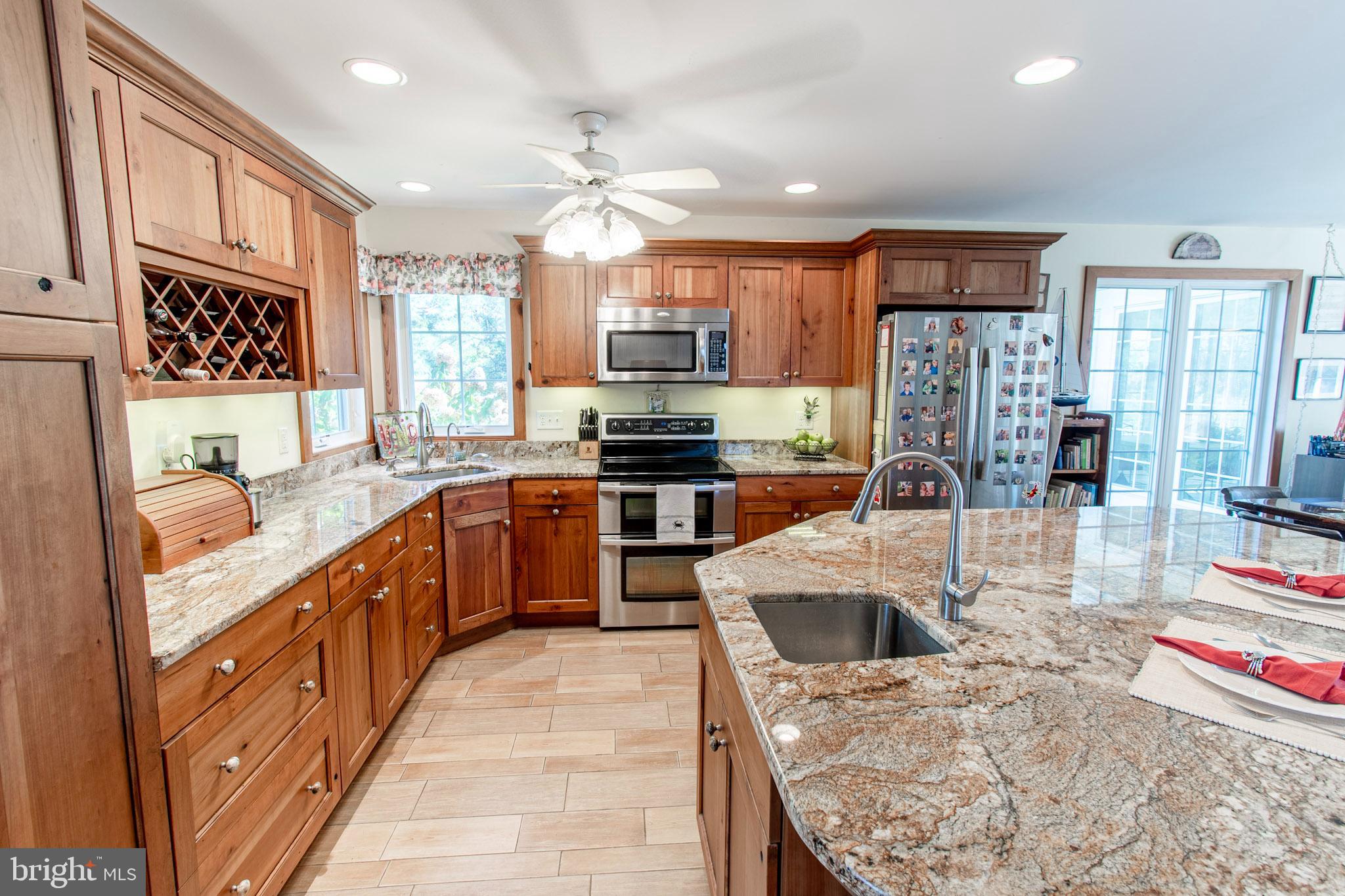6271 Neavitt Manor Road Neavitt, MD 21652 - Photo 10 of 41 Custom wood cabinetry, granite counters.