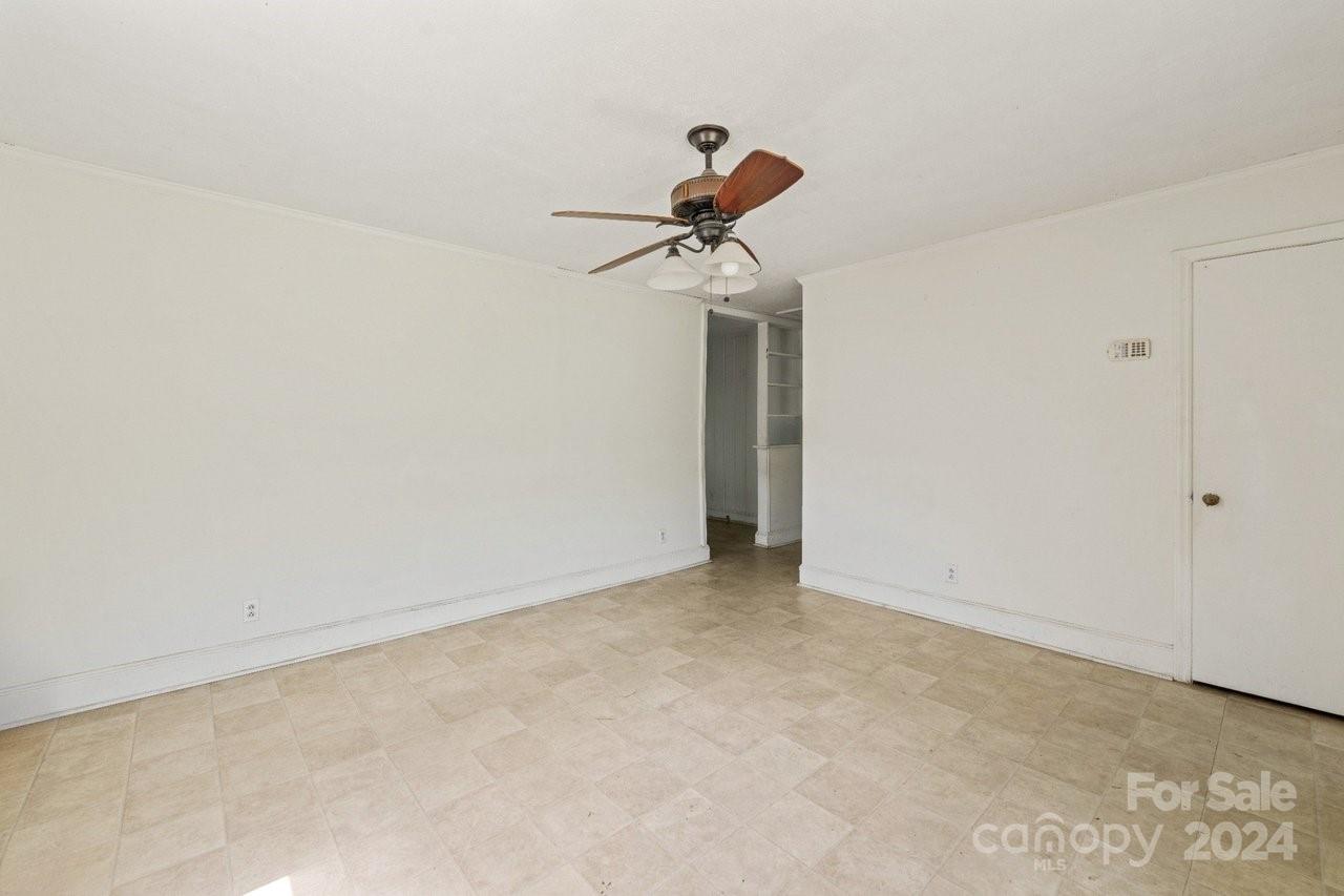 1127 Clanton Road Charlotte, NC 28217 - Photo 5 of 25 a view of room with a fan
