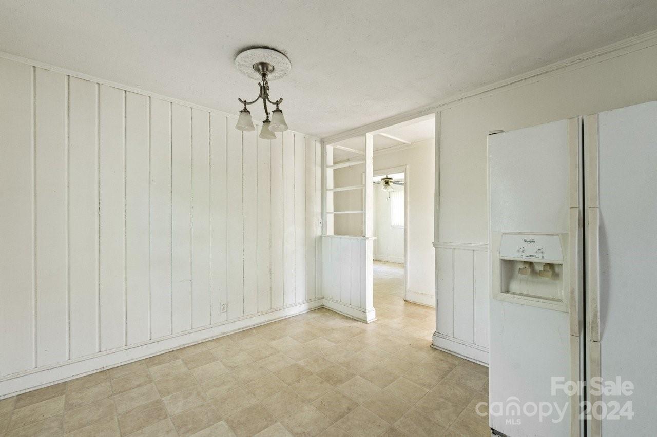 1127 Clanton Road Charlotte, NC 28217 - Photo 10 of 25 a view of a room with an empty space