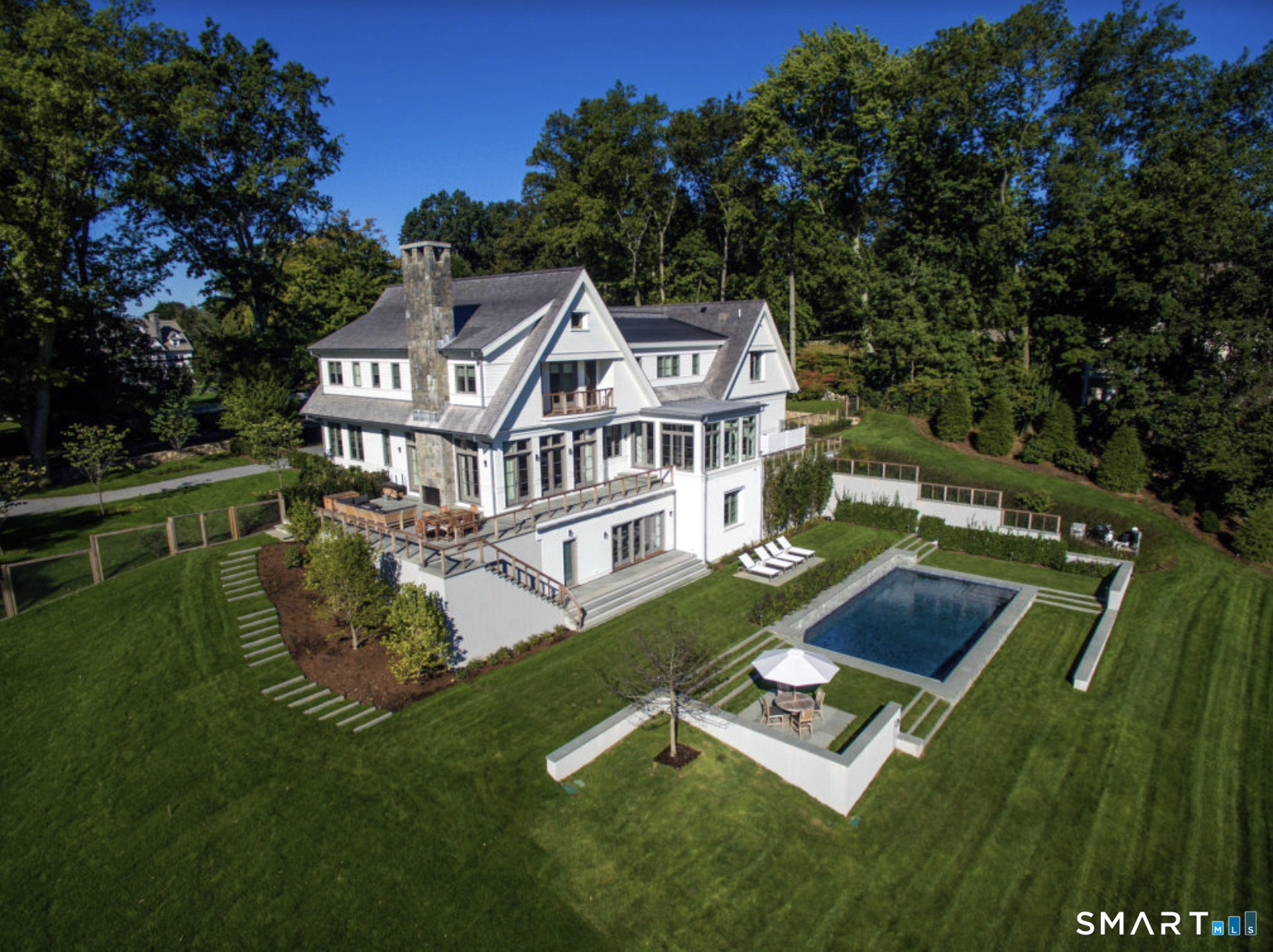 143 Roseville Road Westport, CT 06880 - Photo 5 of 14 a view of a house with pool