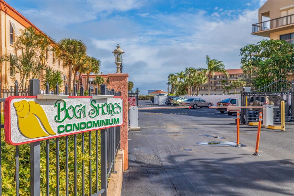 8911 Blind Pass Road, Unit 319 St. Pete Beach, FL 33706 - Photo 2 of 29 a view of outdoor space with seating area