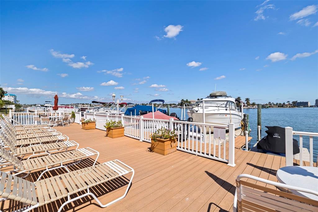 8911 Blind Pass Road, Unit 319 St. Pete Beach, FL 33706 - Photo 28 of 29 a outdoor space with patio