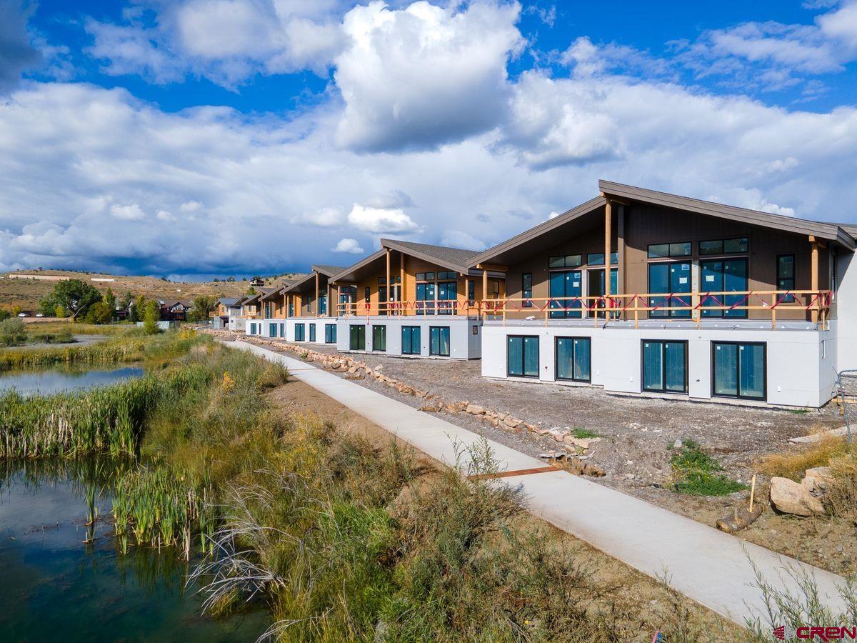 185 Riverfront Lane, Unit D1 B Ridgway, CO 81432 - Photo 28 of 35 a view of houses with sky view