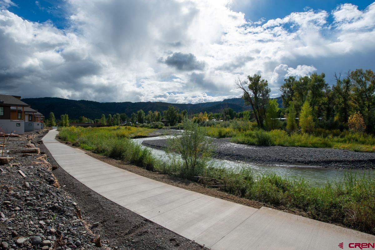 185 Riverfront Lane, Unit D1 B Ridgway, CO 81432 - Photo 7 of 35 a view of a garden with sitting area