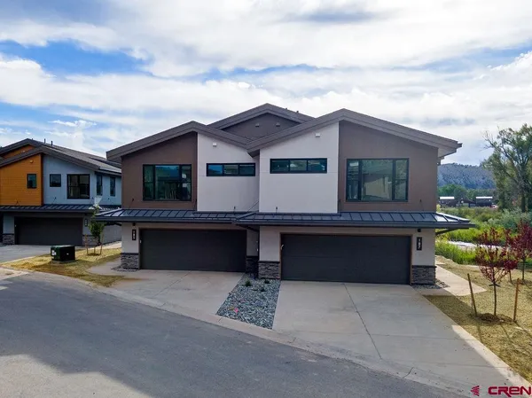 a view of a lake with a city