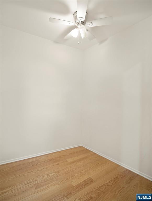 319 Gorge Road, Unit 6 Cliffside Park, NJ 07010 - Photo 11 of 24 an empty room with an entryway and fan