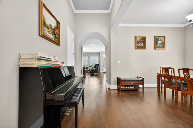 a view of a dining room with furniture window and wooden floor