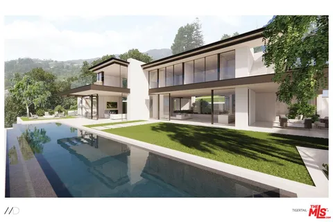 a balcony with table and chairs and potted plants