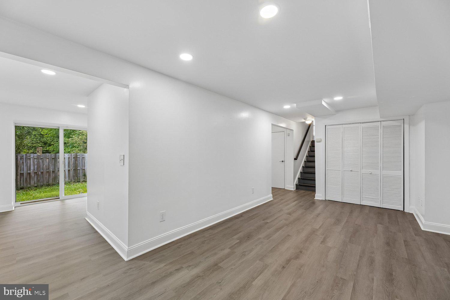 15764 Beau Ridge Drive Woodbridge, VA 22193 - Photo 34 of 58 a view of a room with wooden floor and a window