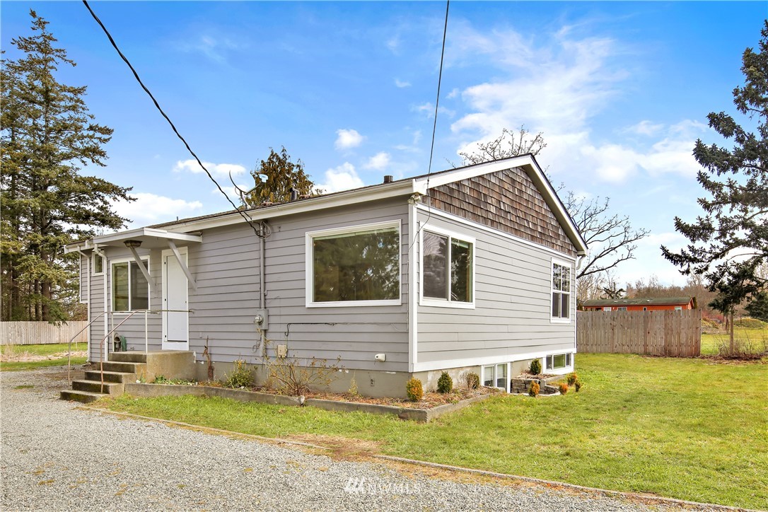 1606 Bayon Road Bellingham, WA 98225 - Photo 1 of 39 a view of a house with a yard