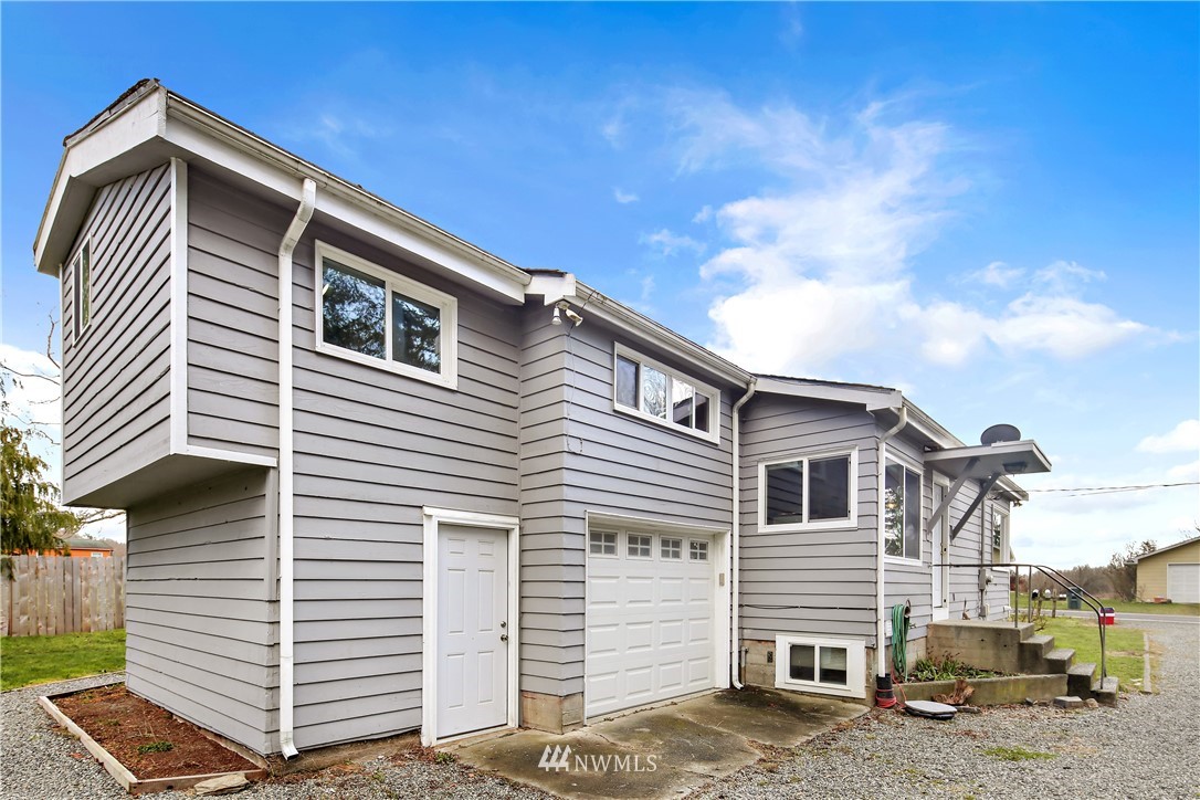 1606 Bayon Road Bellingham, WA 98225 - Photo 3 of 39 a view of a house with a backyard