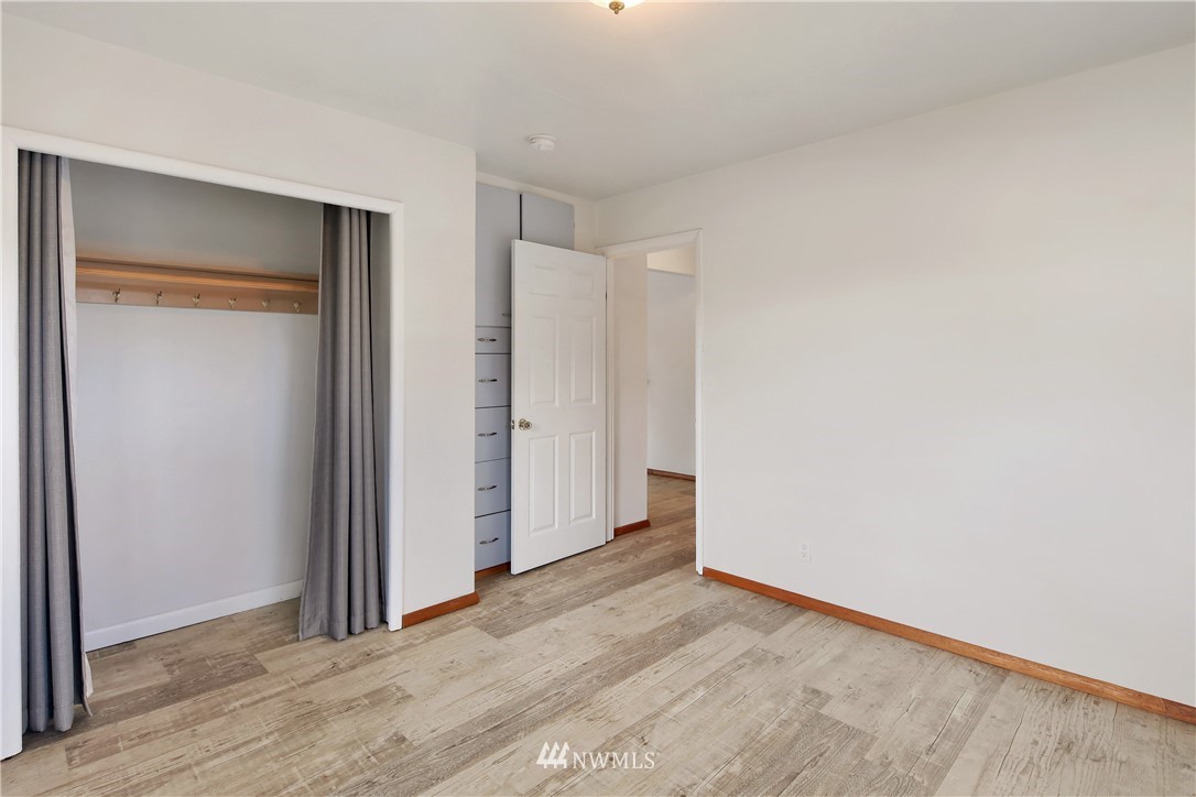 1606 Bayon Road Bellingham, WA 98225 - Photo 23 of 39 a view of an empty room with wooden floor