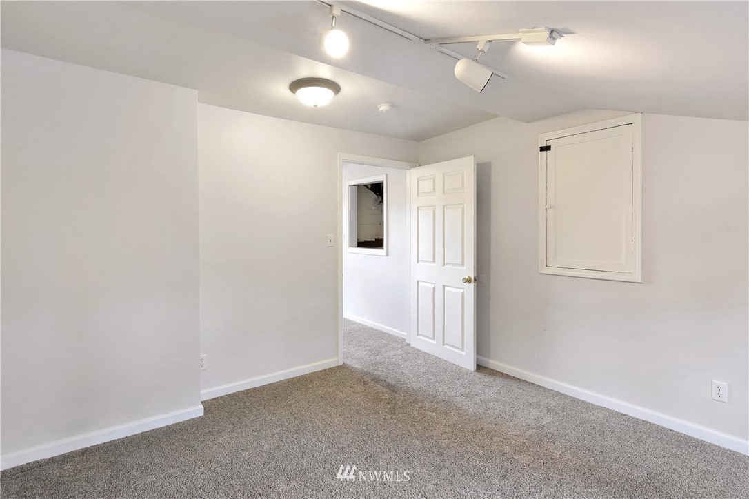 1606 Bayon Road Bellingham, WA 98225 - Photo 28 of 39 an empty room with windows and entrance