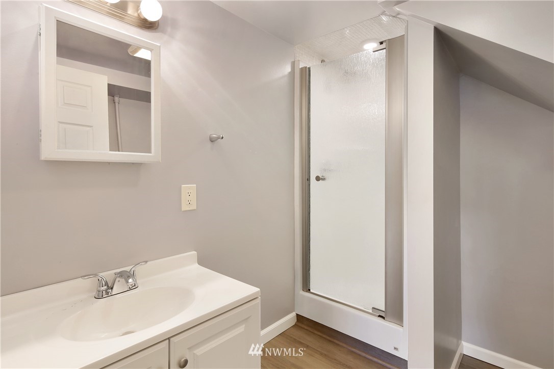 1606 Bayon Road Bellingham, WA 98225 - Photo 31 of 39 a bathroom with a sink and a mirror