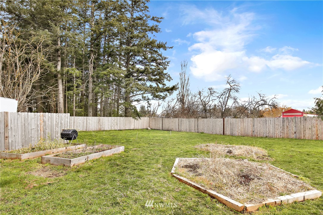 1606 Bayon Road Bellingham, WA 98225 - Photo 33 of 39 a view of a backyard with a small pool