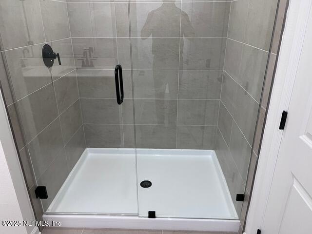 1177 Brk Frst Drive St. Augustine, FL 32092 - Photo 13 of 31 a bathroom with a glass door shower