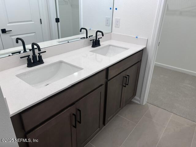 1177 Brk Frst Drive St. Augustine, FL 32092 - Photo 15 of 31 a bathroom with a sink and a mirror