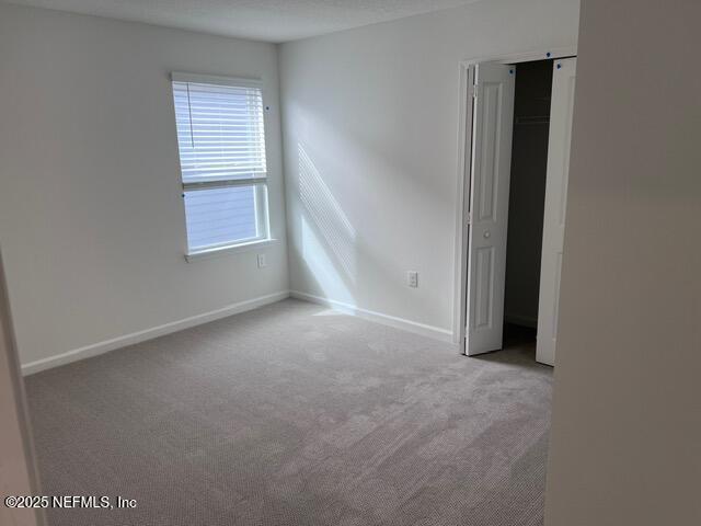 1177 Brk Frst Drive St. Augustine, FL 32092 - Photo 18 of 31 a view of an empty room with a window