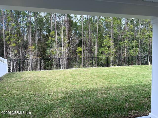 1177 Brk Frst Drive St. Augustine, FL 32092 - Photo 22 of 31 a view of a yard with a trees in the background