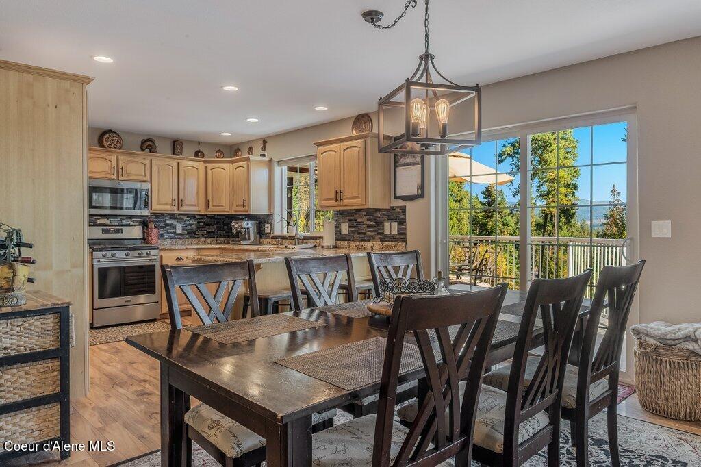 11413 North Summit Loop Post Falls, ID 83854 - Photo 18 of 67 DIning Room and Kitchen
