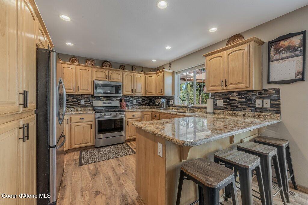 11413 North Summit Loop Post Falls, ID 83854 - Photo 20 of 67 Ample Cabinet Storage in Kitchen