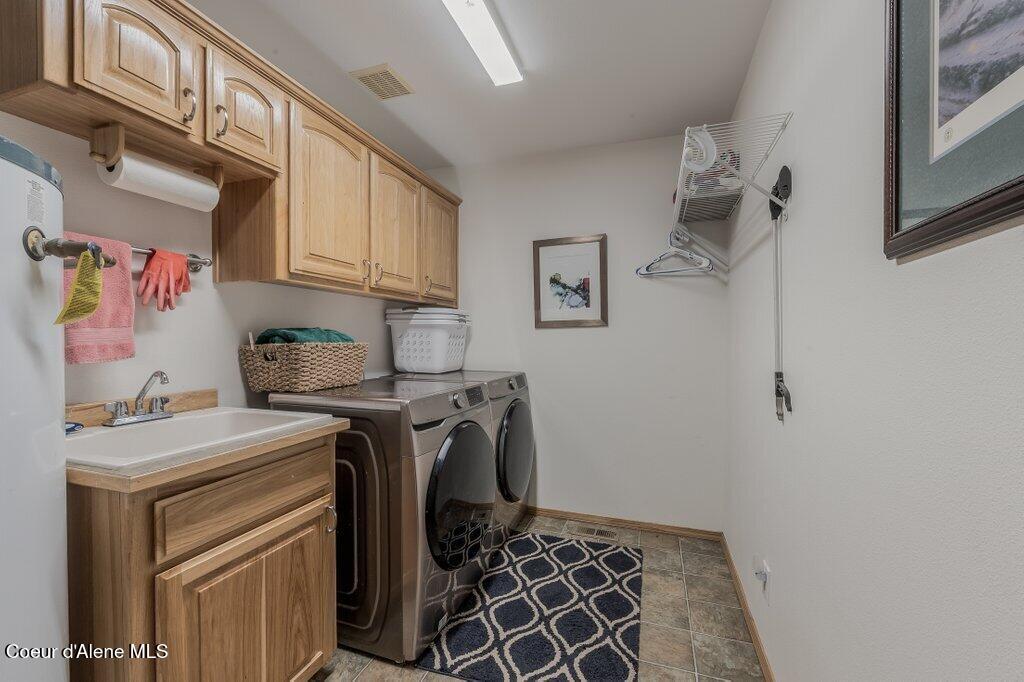 11413 North Summit Loop Post Falls, ID 83854 - Photo 37 of 67 Well Appointed Laundry Area