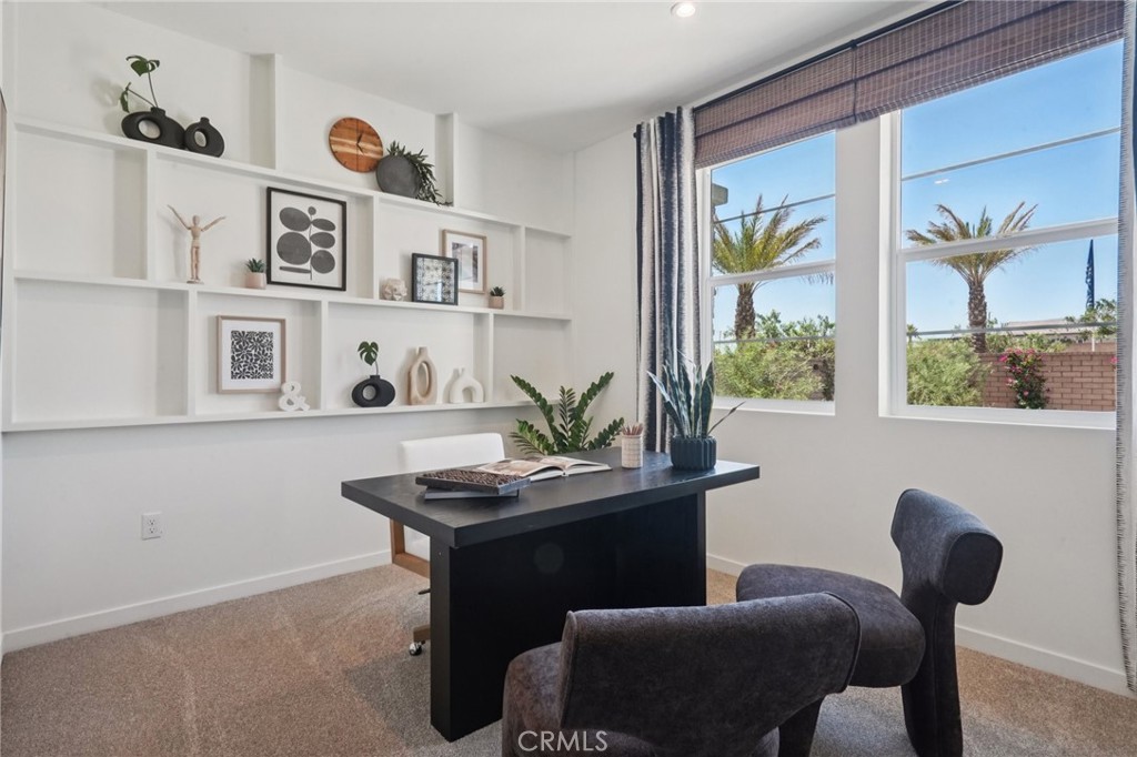 73634 Raphael Drive Palm Desert, CA 92211 - Photo 29 of 42 a living room with furniture and window