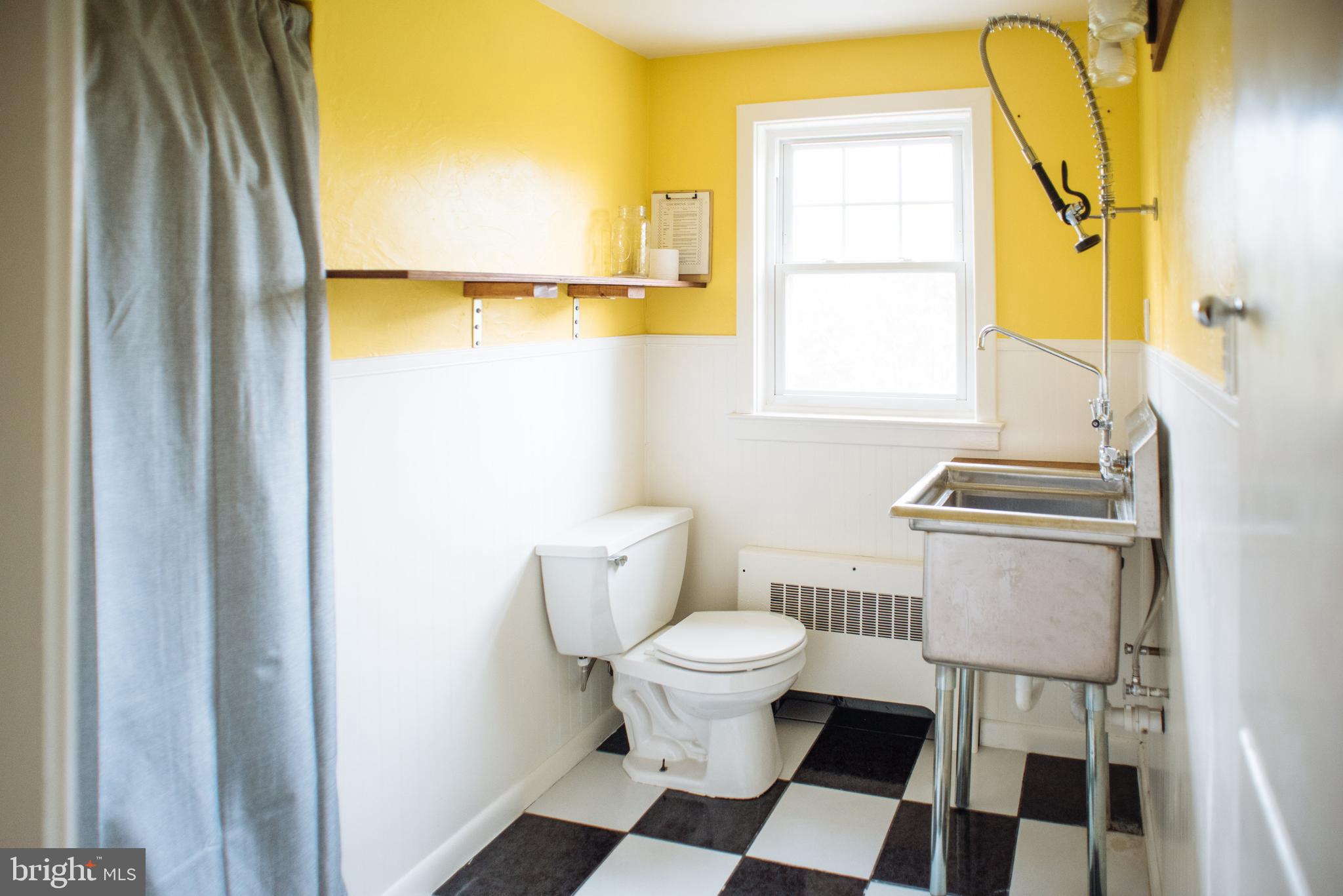 9448 Elizabethtown Road Elizabethtown, PA 17022 - Photo 33 of 48 a bathroom with a sink toilet and shower