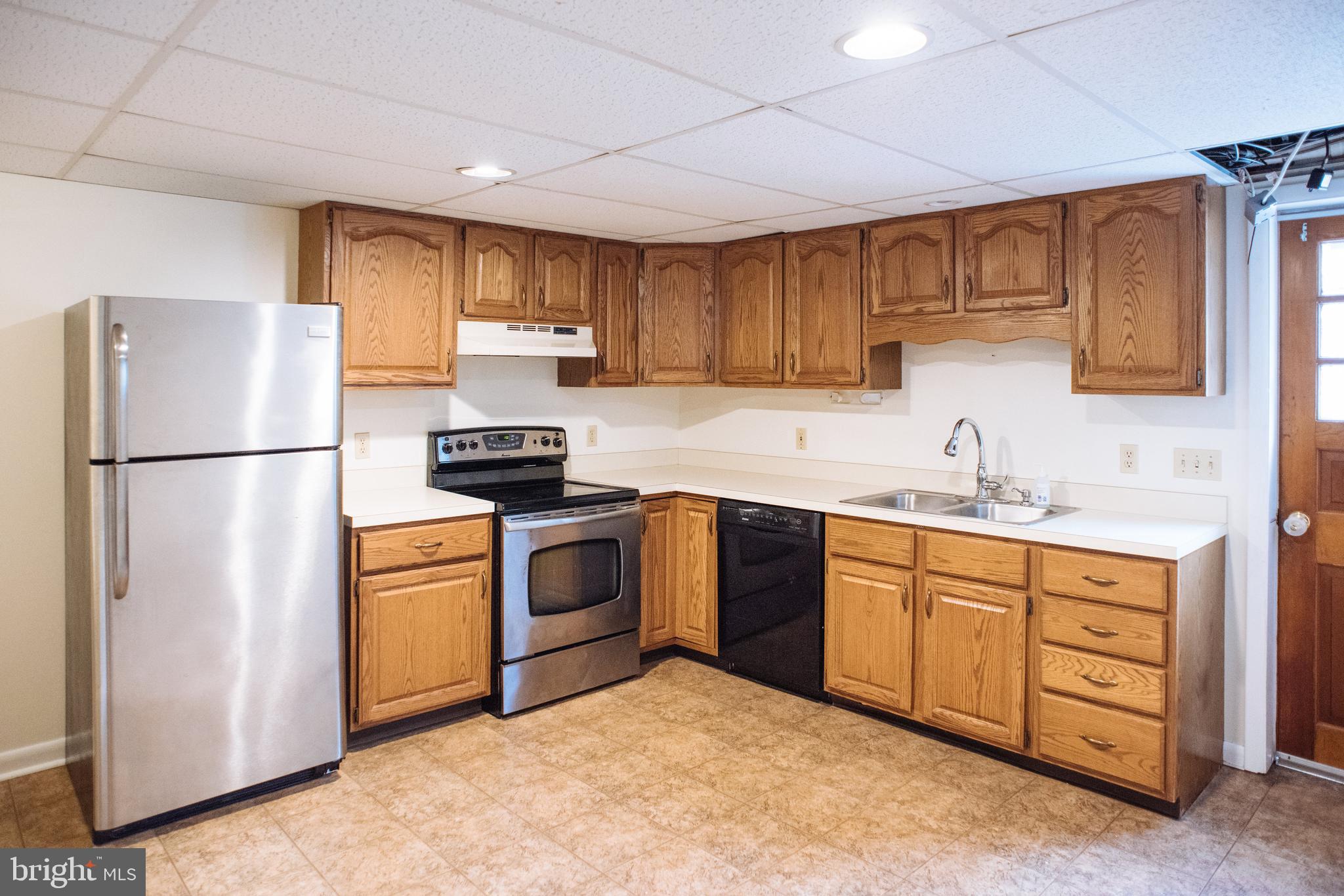 9448 Elizabethtown Road Elizabethtown, PA 17022 - Photo 39 of 48 a kitchen with stainless steel appliances granite countertop a refrigerator sink and stove