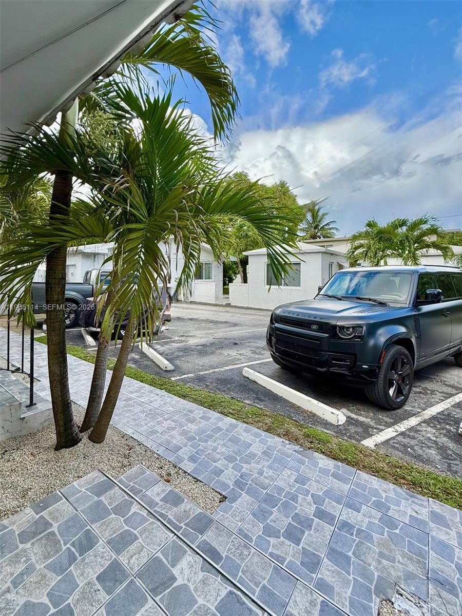 64 Northeast 78th Street, Unit 2 Miami, FL 33138 - Photo 1 of 11 a view of a car in front of a house