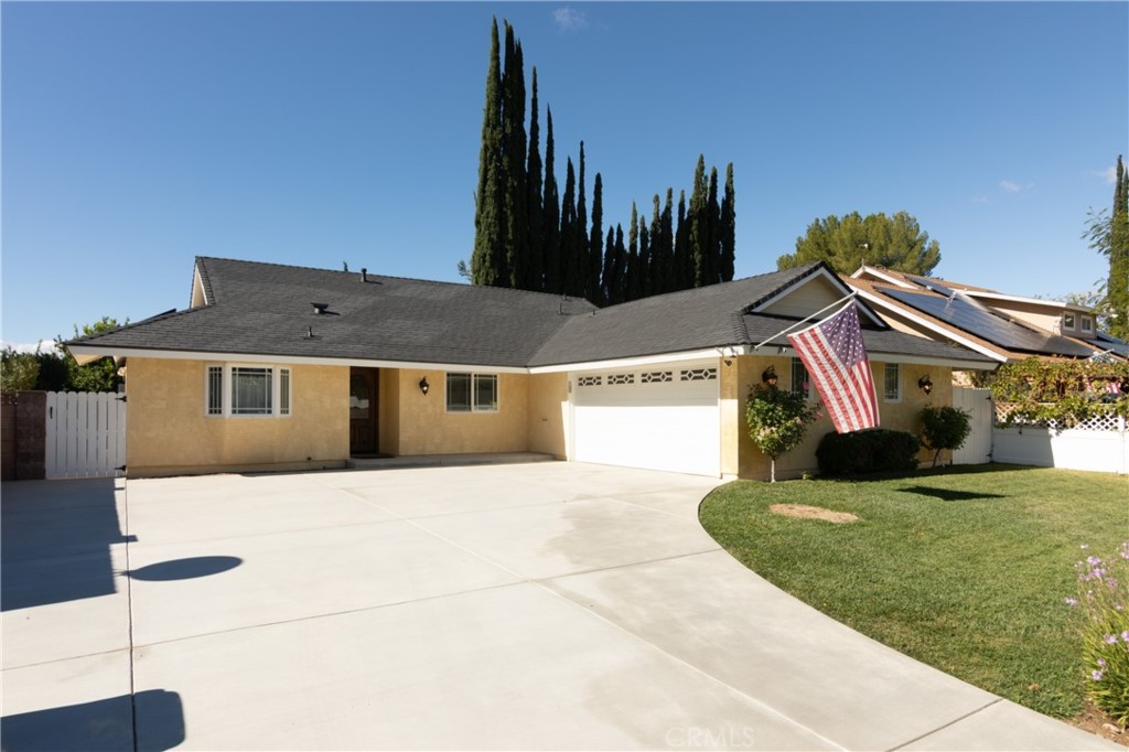 28009 Newbird Drive Saugus, CA 91350 - Photo 1 of 26 a front view of a house with a yard