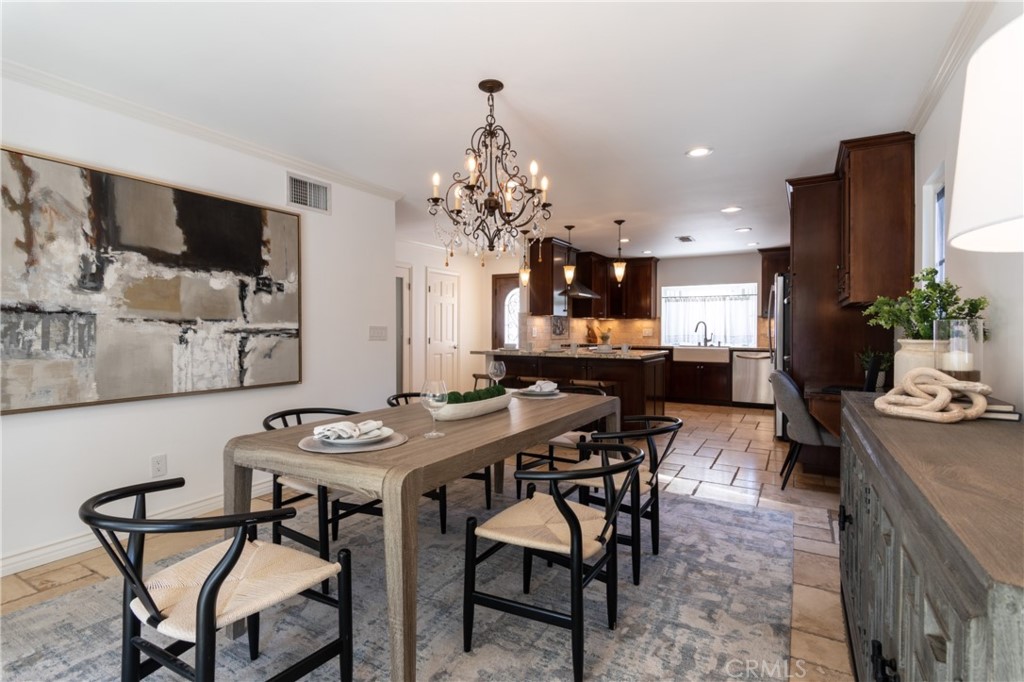 28009 Newbird Drive Saugus, CA 91350 - Photo 12 of 26 a view of a dining room with furniture and wooden floor