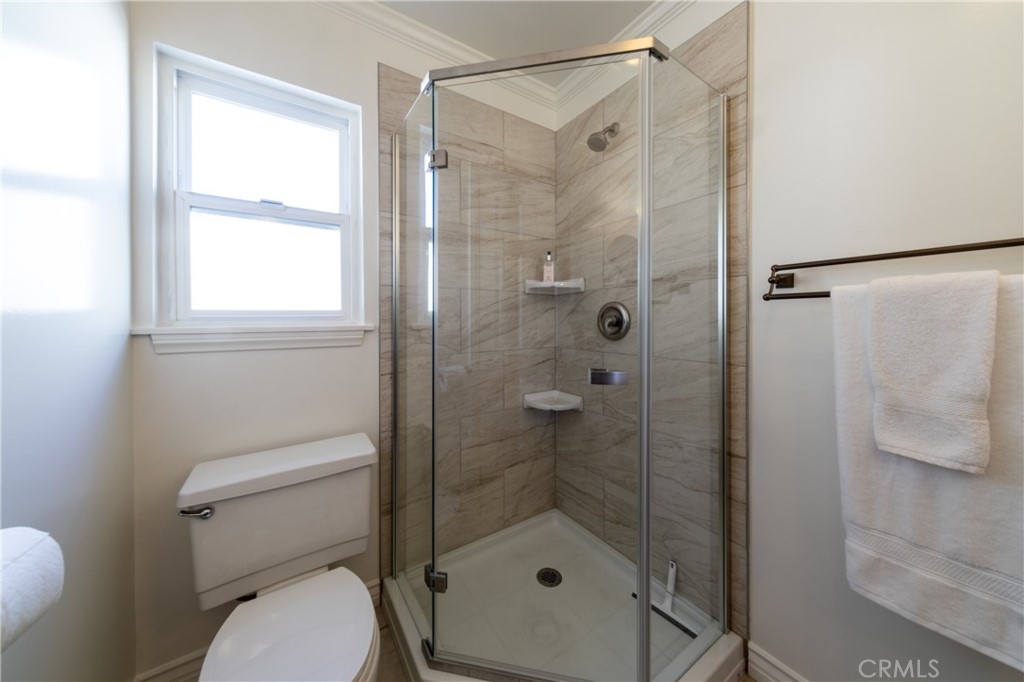 28009 Newbird Drive Saugus, CA 91350 - Photo 16 of 26 a bathroom with a shower and a toilet