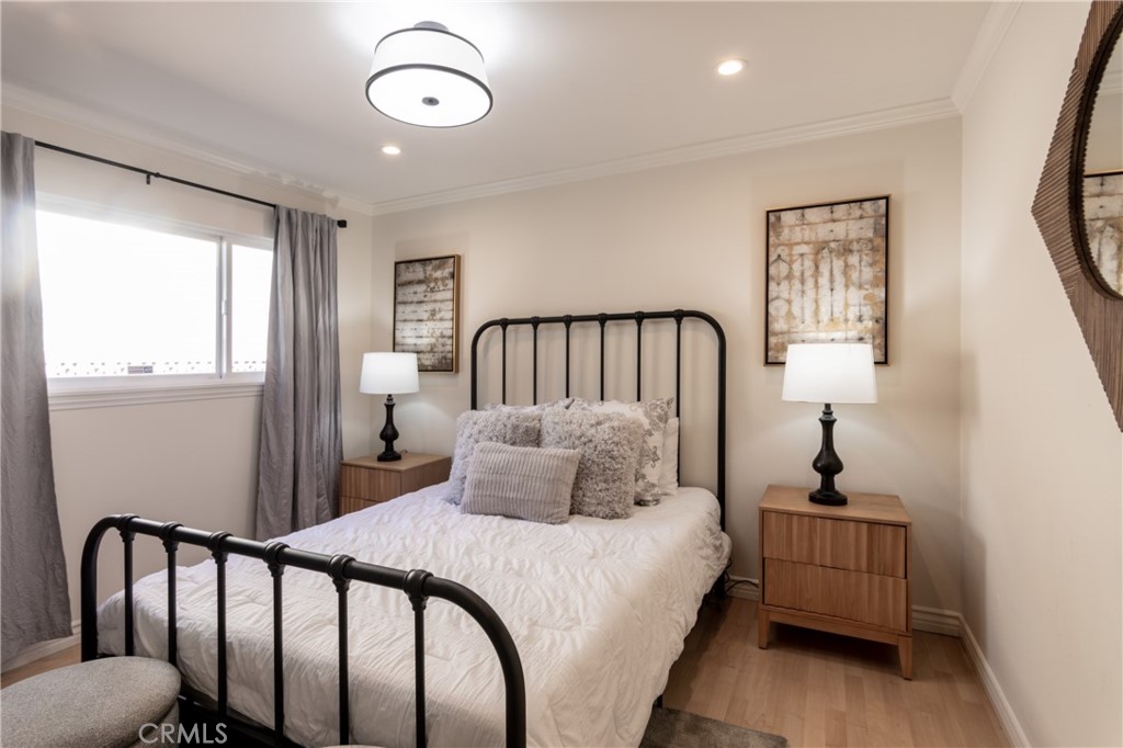 28009 Newbird Drive Saugus, CA 91350 - Photo 19 of 26 a bedroom with a bed and a window