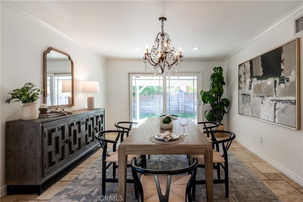 28009 Newbird Drive Saugus, CA 91350 - Photo 9 of 26 a view of a dining room with furniture window and wooden floor