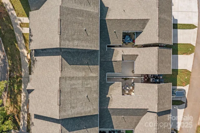 an aerial view of a house with a outdoor space