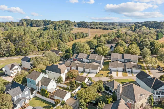 an aerial view of a building with outdoor space