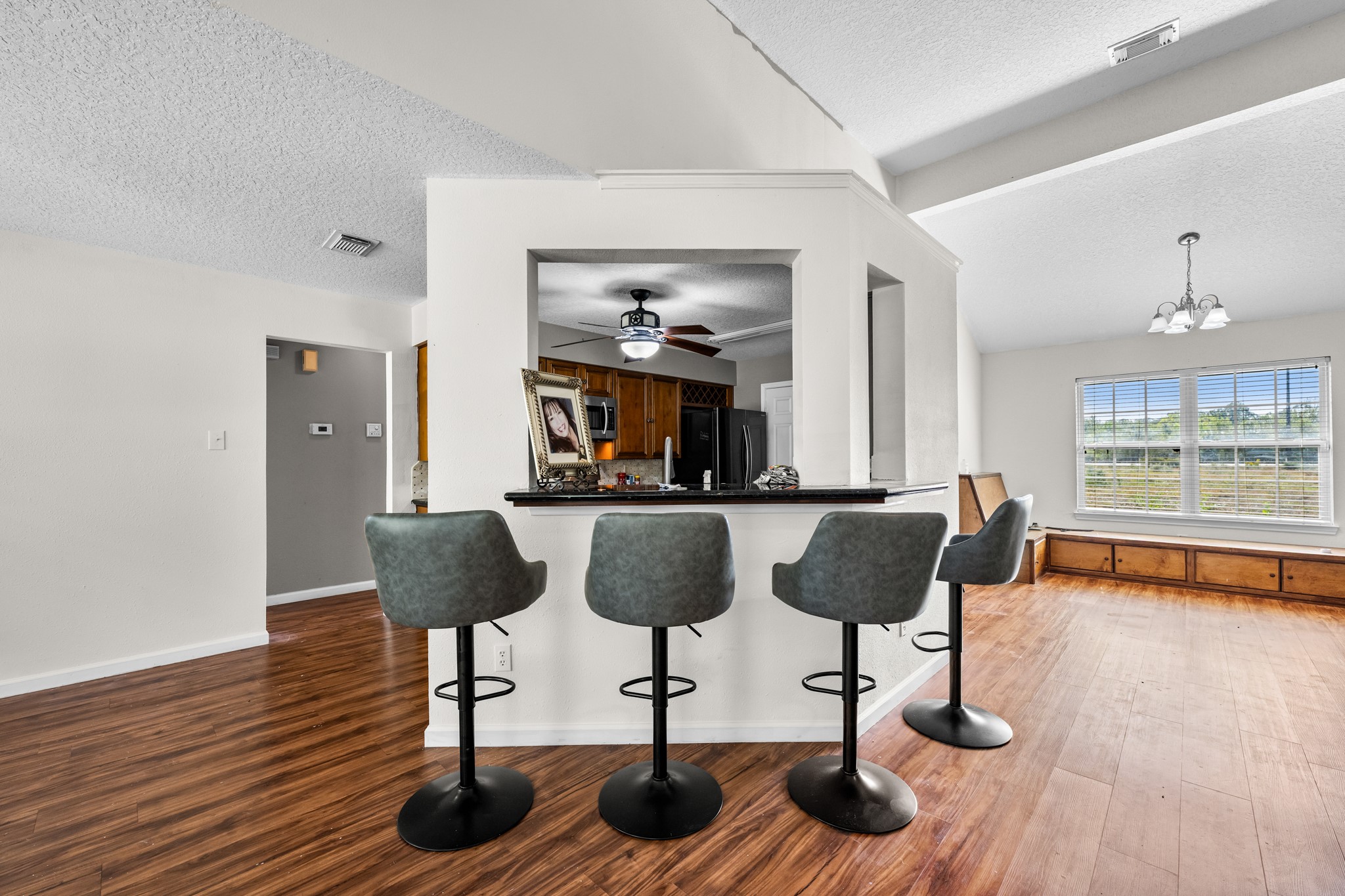 7442 County Road 42 Rosharon, TX 77583 - Photo 14 of 43 a living room with furniture and a wooden floor