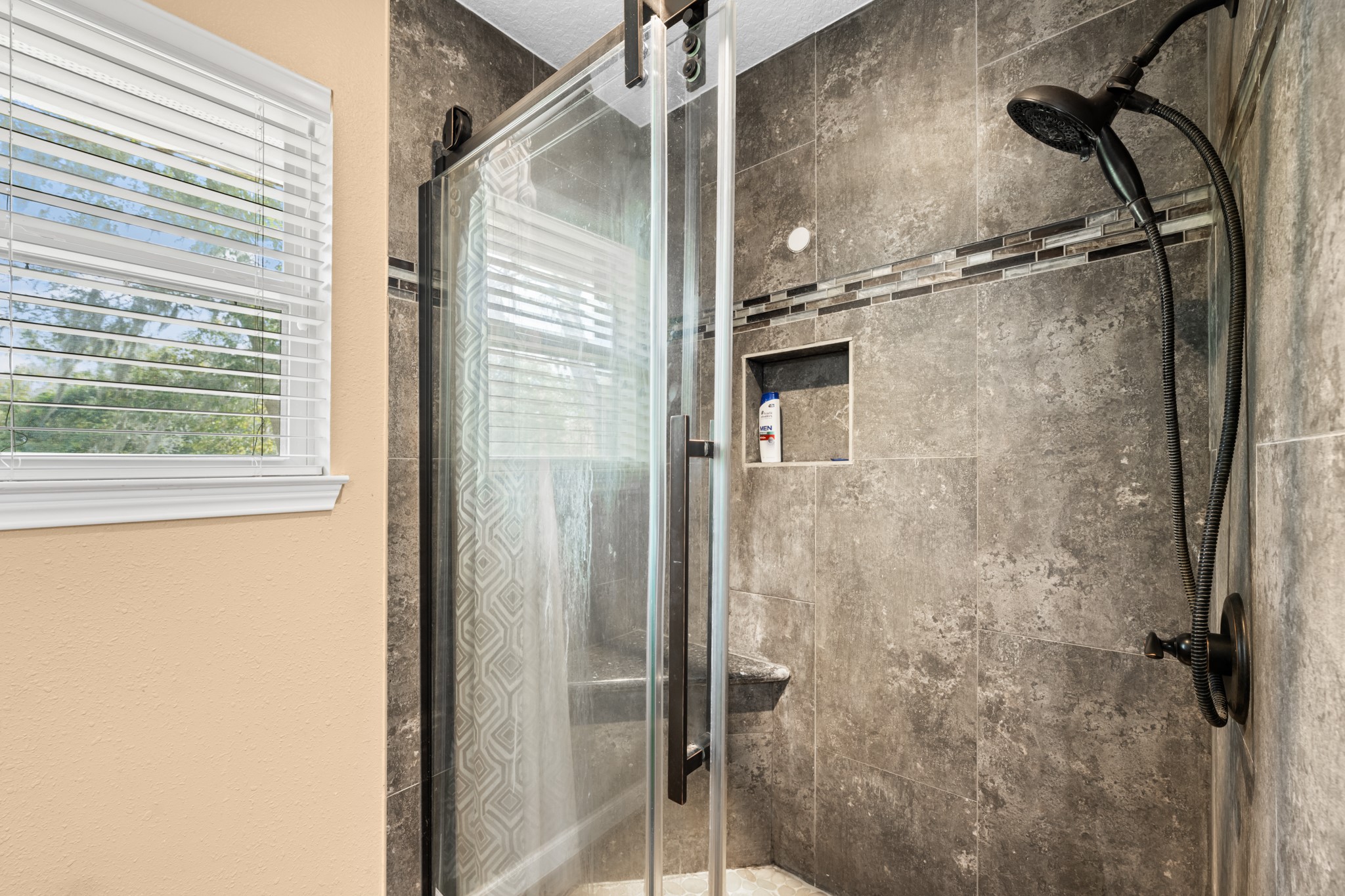 7442 County Road 42 Rosharon, TX 77583 - Photo 27 of 43 a bathroom with a glass shower door