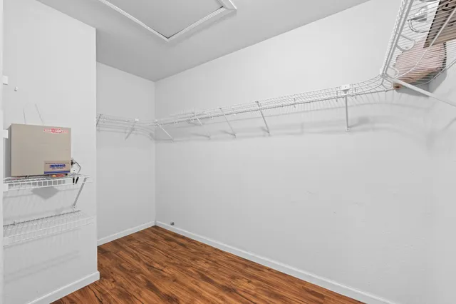 a view of a room with racks on the wall