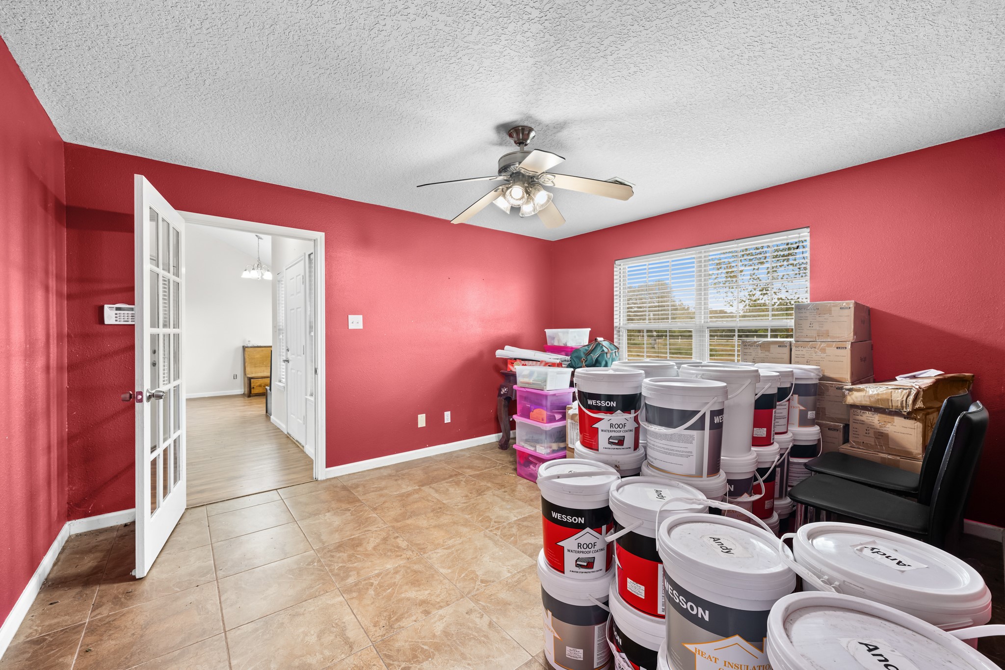 7442 County Road 42 Rosharon, TX 77583 - Photo 37 of 43 a living room with furniture and a floor to ceiling window