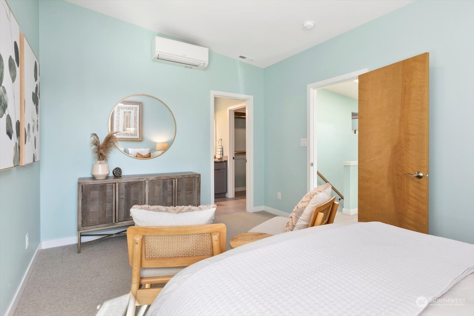 1402 194th Street Southeast, Unit 4 Bothell, WA 98012 - Photo 18 of 40 a bedroom with a bed and a mirror