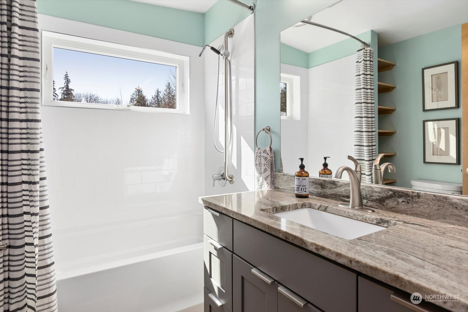 1402 194th Street Southeast, Unit 4 Bothell, WA 98012 - Photo 23 of 40 a bathroom with a granite countertop sink mirror and a